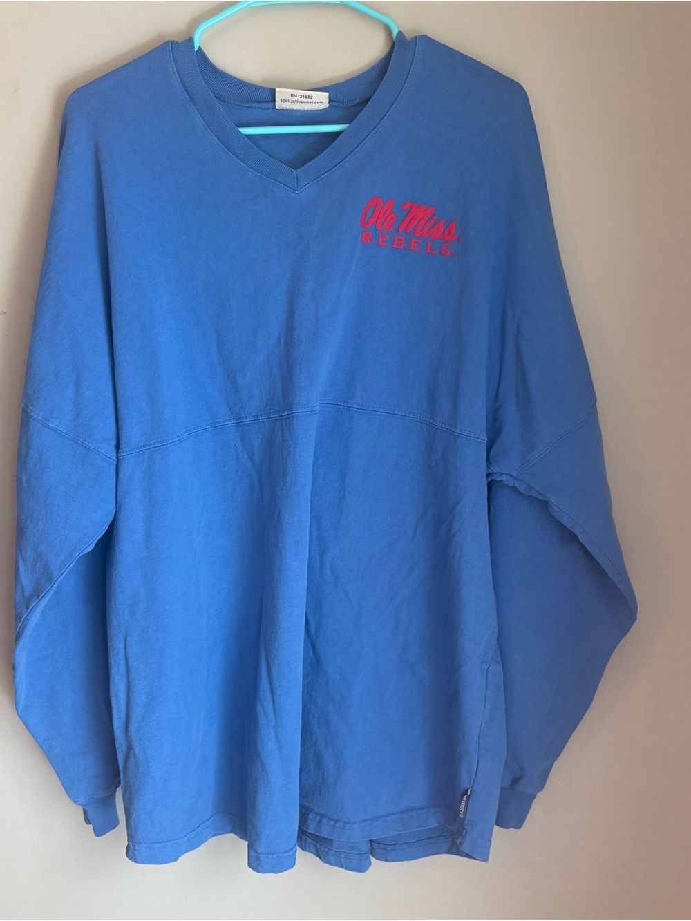 Spirit Blue V-Neck Long Sleeve with Red Ole Miss Logo